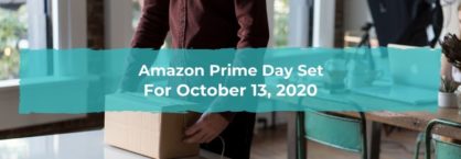 A man wraps a package from Amazon that he ordered on Prime Day